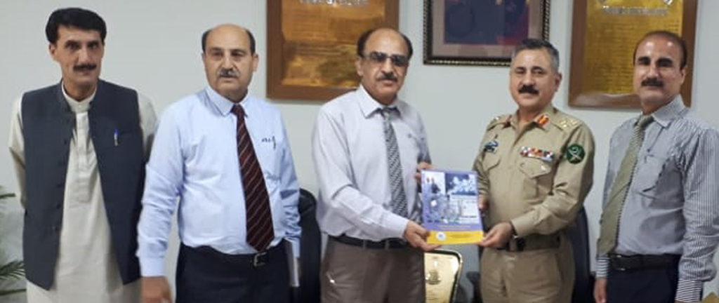Vice-Chancellor-Prof.-Dr.-Attaullah-Shah-presenting-his-book-to-Lt.-Gen